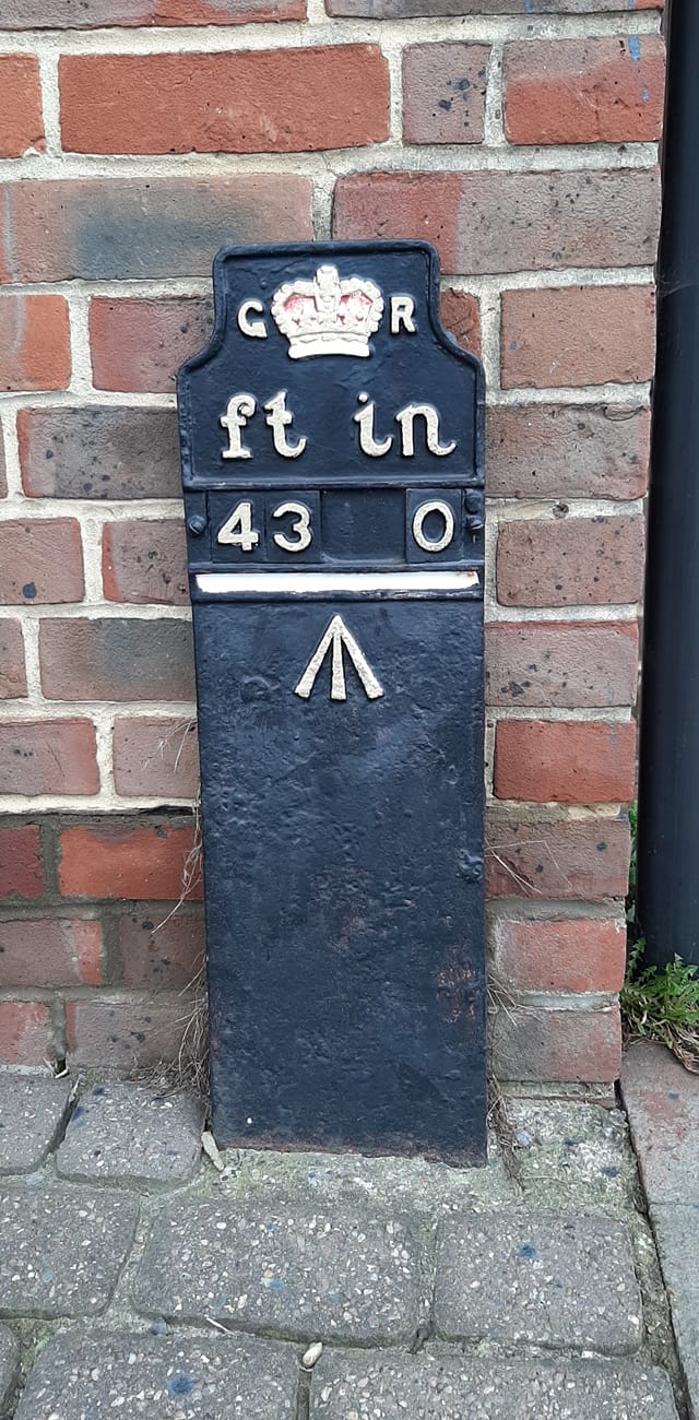 Telegraph cable marker post at Rye Heritage Centre, Strand Quay, Rye by Tamzin Thomas 