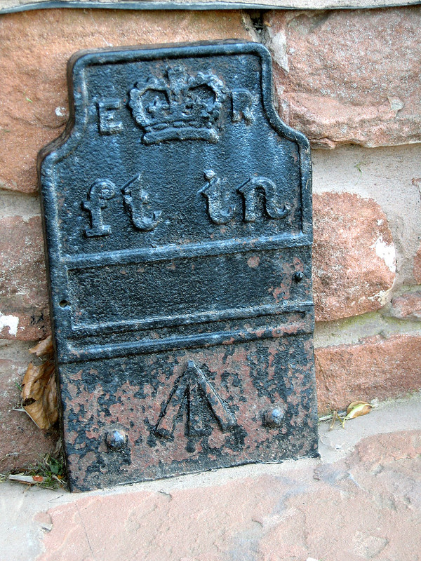 Telegraph cable marker post at 4 High Street, High Heskett, Cumbria by Russell W Barnes 