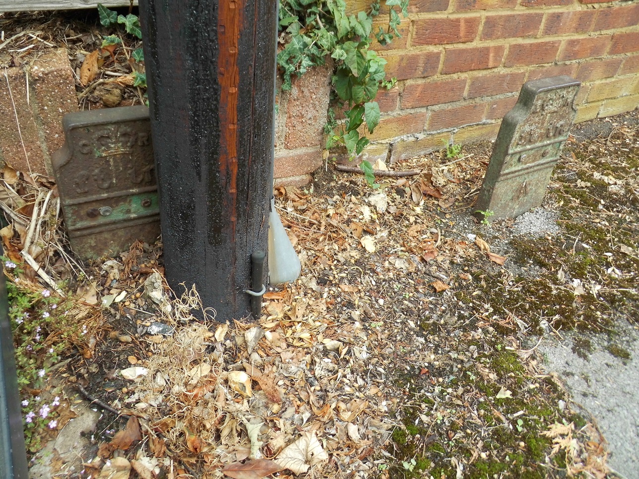 Telegraph cable marker post at 258 Hempstead Road, Watford by Derek Pattenson 