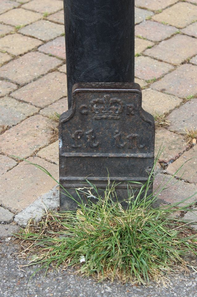 Telegraph cable marker post at 28 Victoria Road, Horley, Surrey by John Chisholm 