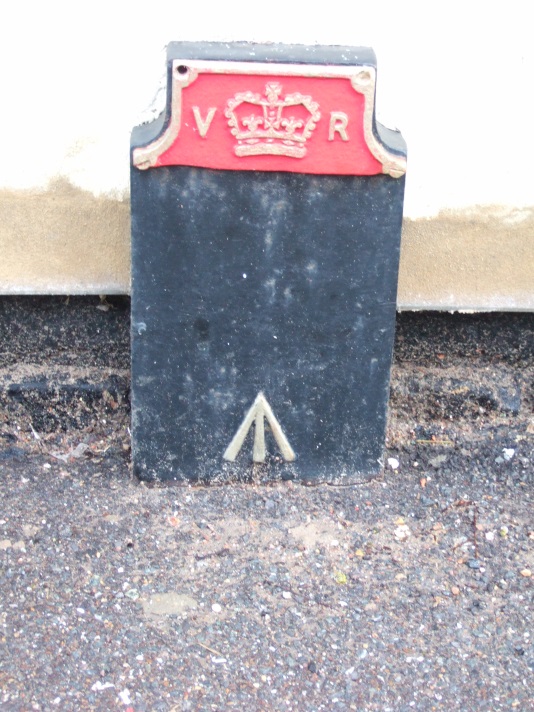 Telegraph cable marker post at 28 Watling Street, Towcester by Brian Giggins 