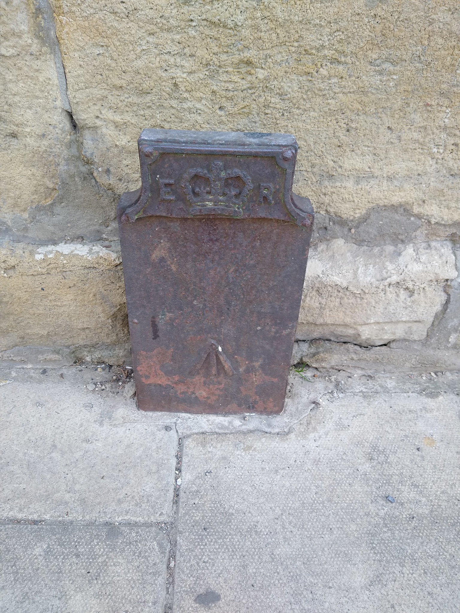 Telegraph cable marker post at 27 High Street, Wetherby by Don Boldison 