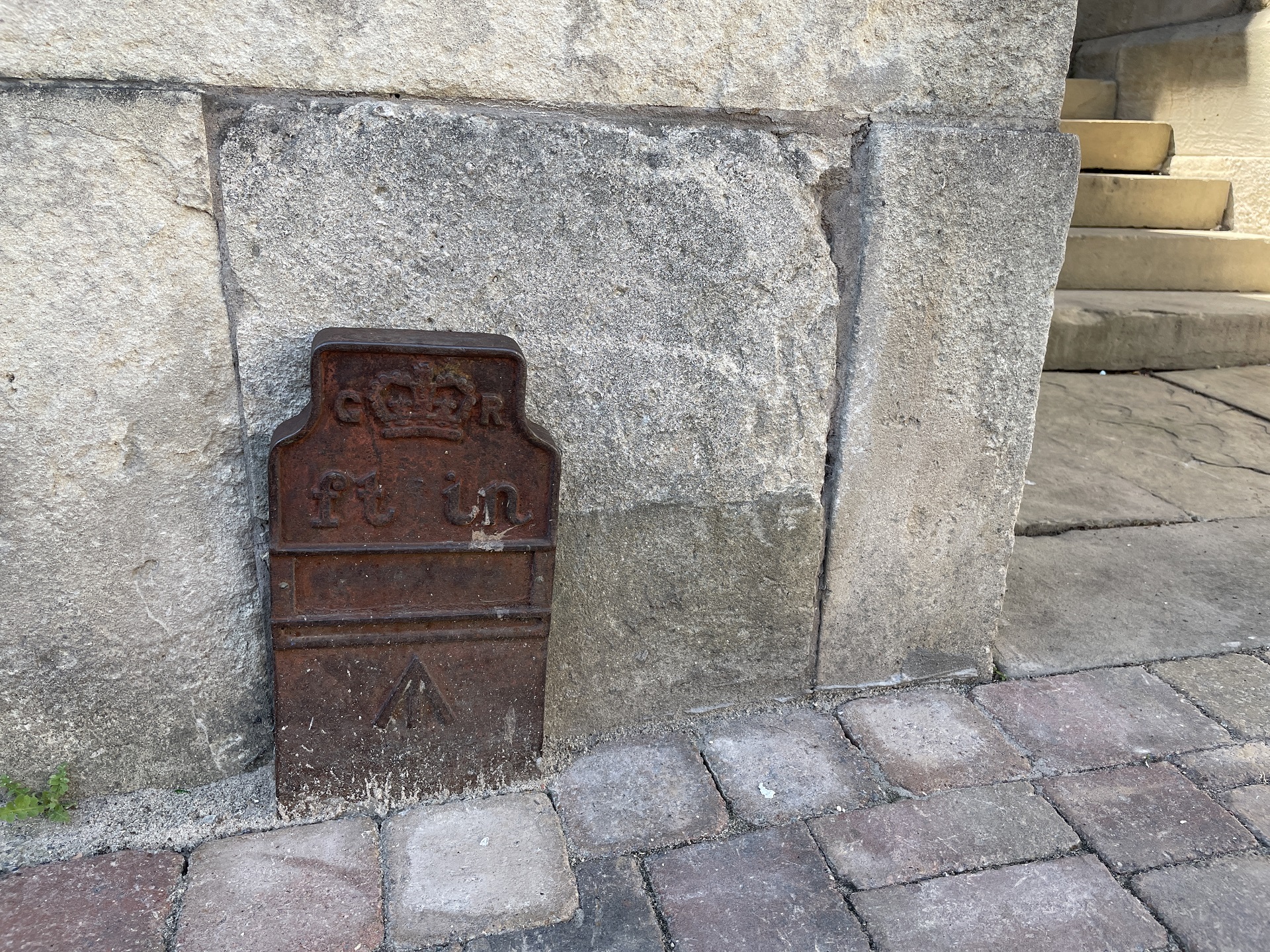 Telegraph cable marker post at 45 Angel Place, Worcester by Catrin Meredith 