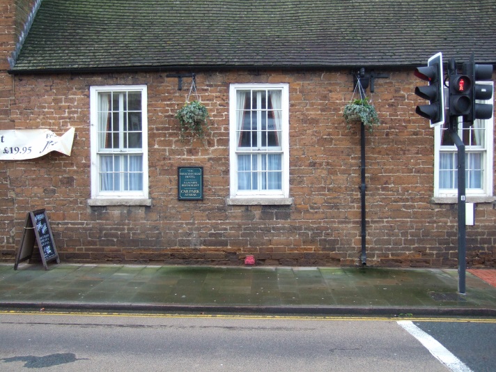 Telegraph cable marker post at Saracen's Head, 219 Watling Street, Towcester by Brian Giggins 