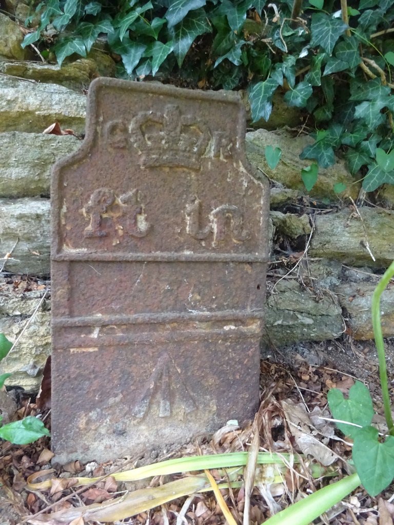 Telegraph cable marker post at 7 London Road, Daventry by Mr Red 