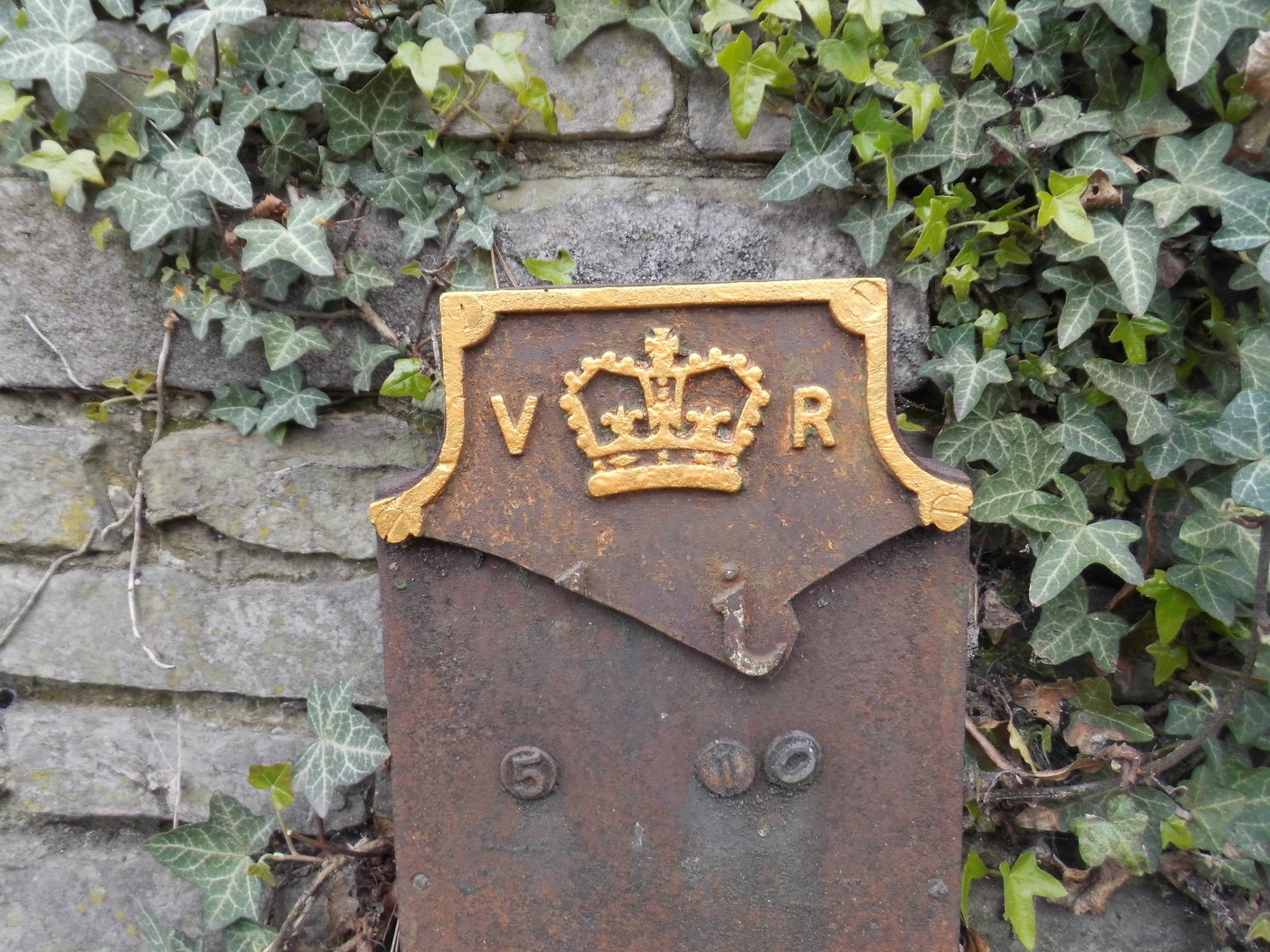 Telegraph cable marker post at 205 Hempstead Road, Watford by Derek Pattenson 