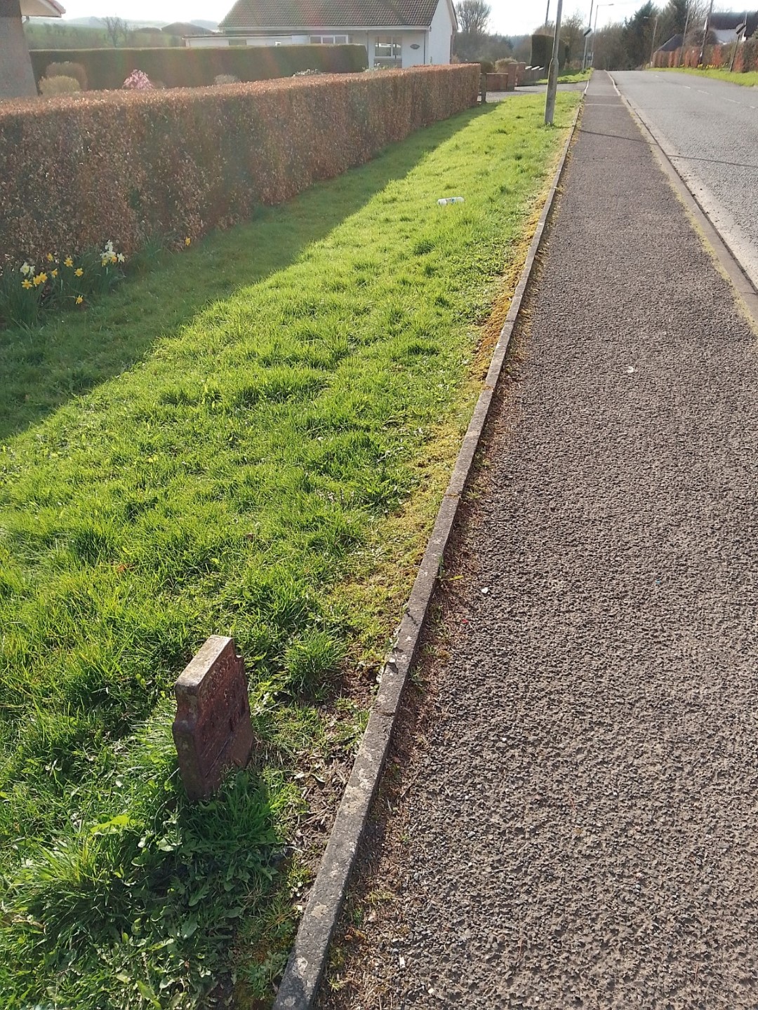 Telegraph cable marker post at 42 Carlisle Road, Lockerbie by Derek Pattenson 