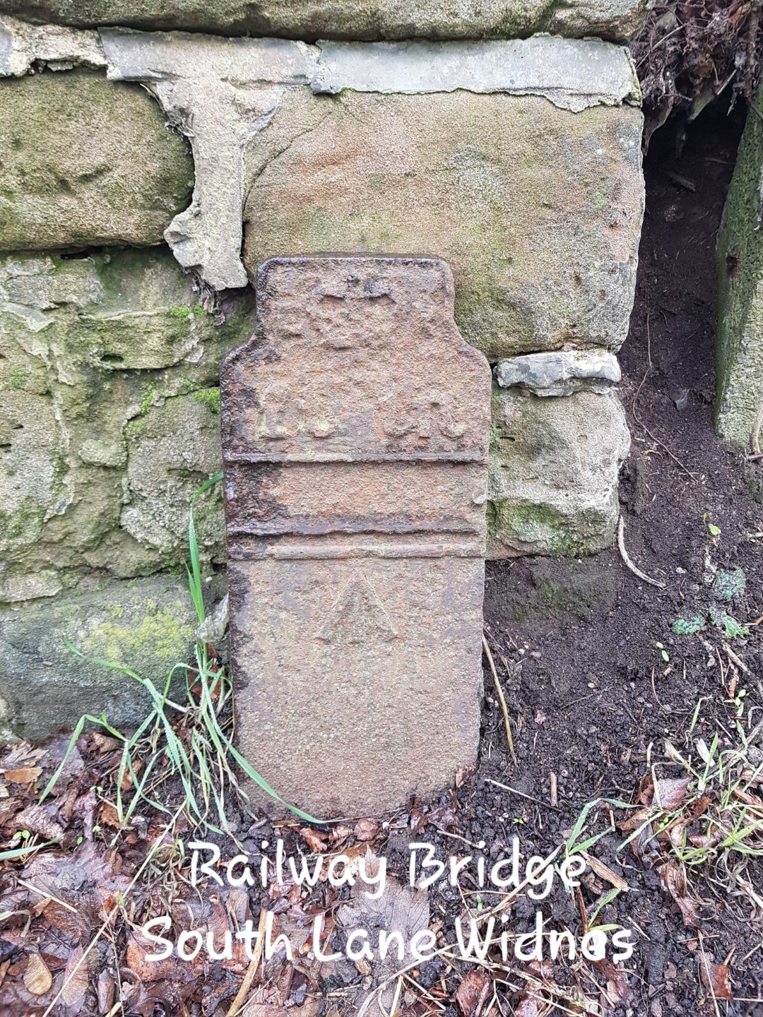 Telegraph cable marker post at Retaining wall, E side of rly overbridge, South Lane, Widnes by Jan Gibbons 