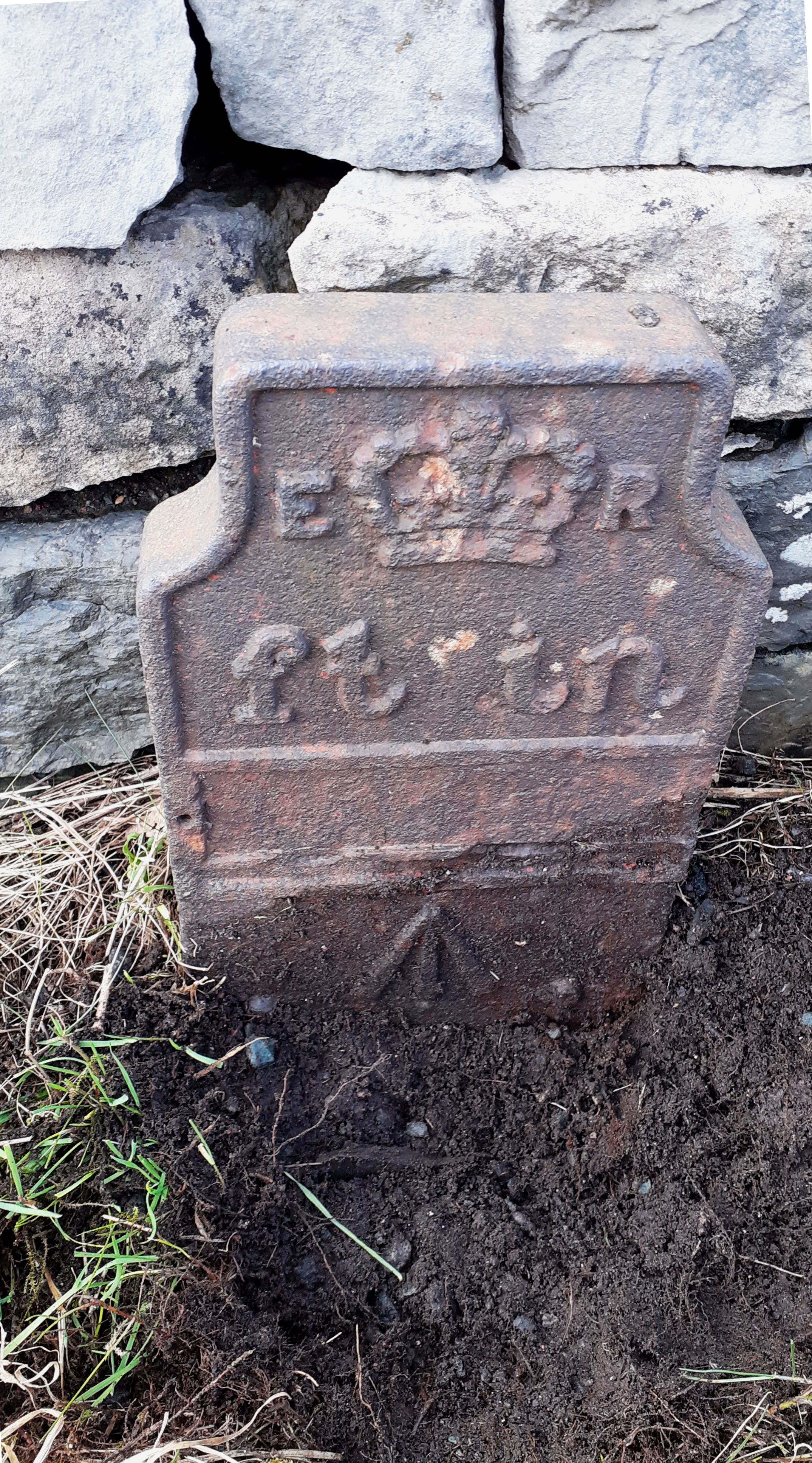 Telegraph cable marker post at A6 W side, 25m S of where cables cross road, Kendal by Roger Templeman 