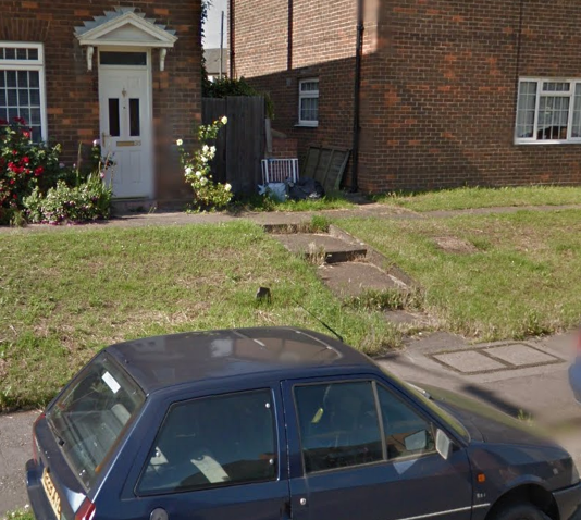 Telegraph cable marker post at 35 Hamilton Road, Taunton by Google Streetview 